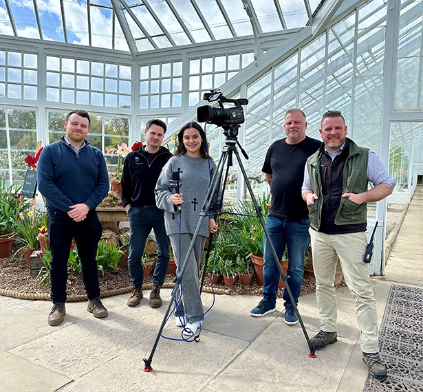 Members of Jericho, Notts TV and Clumber Park posing for a photo with TV camera